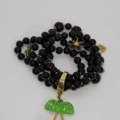 LOT 5:: Betsey Johnson Multi bead Charm Bracelet featuring Cherries, flower and lil worm has her hangtag we included a jewelry satchel