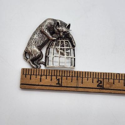 LOT 6:: FOUR Sterling Brooches- Enamel and Marcasite Scottie dog, Enamel Maple Leaf "Mother" Pin, an Owl marked JA- James...