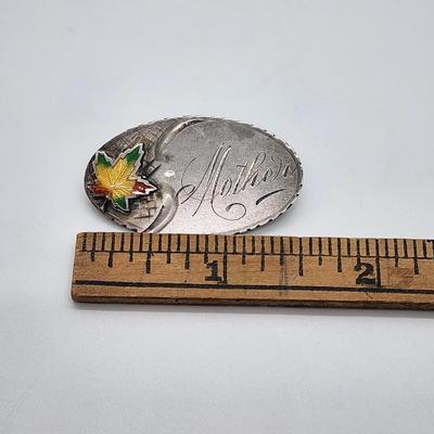 LOT 6:: FOUR Sterling Brooches- Enamel and Marcasite Scottie dog, Enamel Maple Leaf "Mother" Pin, an Owl marked JA- James...