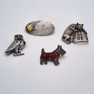 LOT 6:: FOUR Sterling Brooches- Enamel and Marcasite Scottie dog, Enamel Maple Leaf "Mother" Pin, an Owl marked JA- James...