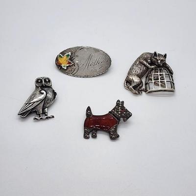 LOT 6:: FOUR Sterling Brooches- Enamel and Marcasite Scottie dog, Enamel Maple Leaf "Mother" Pin, an Owl marked JA- James...