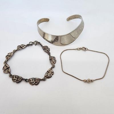 LOT:: Sterling Silver Bracelets- Classis Wave Cuff, I7" L Italian balls on rope chain and 7" L Comedy tragedy theater masks 30.8g