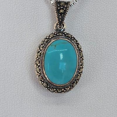 LOT 34:: Sterling Turquoise and Marcasite double sided pendant on 16" L 925 Italy chain