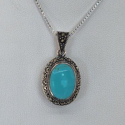 LOT 34:: Sterling Turquoise and Marcasite double sided pendant on 16" L 925 Italy chain