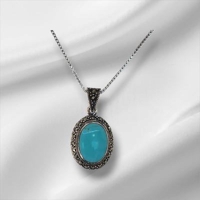 LOT 34:: Sterling Turquoise and Marcasite double sided pendant on 16" L 925 Italy chain