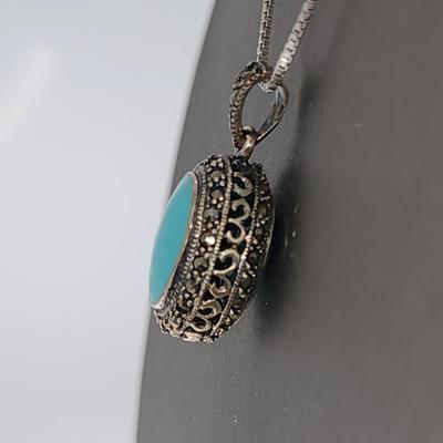 LOT 34:: Sterling Turquoise and Marcasite double sided pendant on 16" L 925 Italy chain