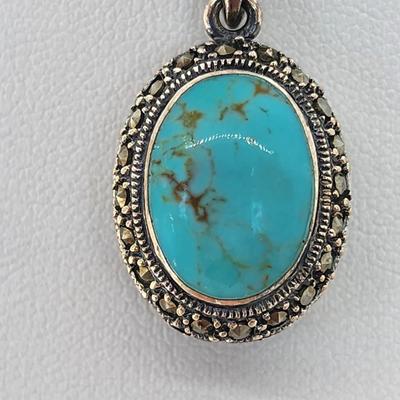 LOT 34:: Sterling Turquoise and Marcasite double sided pendant on 16" L 925 Italy chain