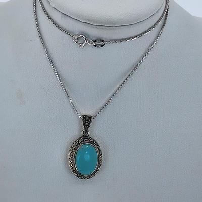 LOT 34:: Sterling Turquoise and Marcasite double sided pendant on 16" L 925 Italy chain