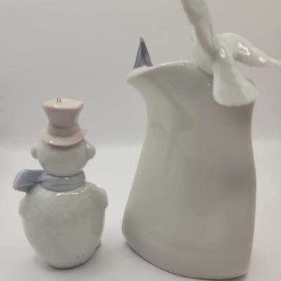 LOT:: 47 Lladro "Art Brings Us Together" #7677 & Lladro Snowman Ornament