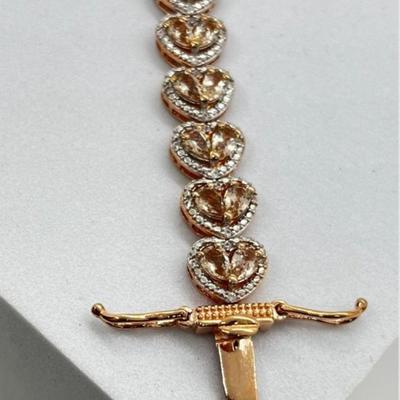 LOT 83:: New! GORGEOUS! Morganite and Diamond Heart Shaped Tennis Bracelet and Matching Earrings in oval cut Morganites set in Rose Gold...