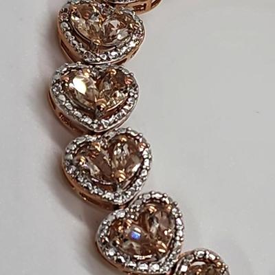 LOT 83:: New! GORGEOUS! Morganite and Diamond Heart Shaped Tennis Bracelet and Matching Earrings in oval cut Morganites set in Rose Gold...