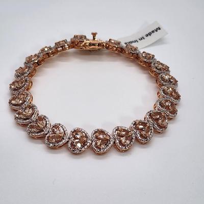LOT 83:: New! GORGEOUS! Morganite and Diamond Heart Shaped Tennis Bracelet and Matching Earrings in oval cut Morganites set in Rose Gold...