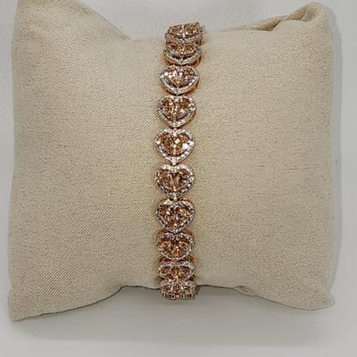 LOT 83:: New! GORGEOUS! Morganite and Diamond Heart Shaped Tennis Bracelet and Matching Earrings in oval cut Morganites set in Rose Gold...