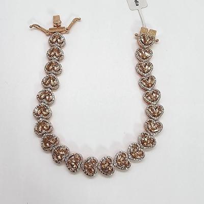 LOT 83:: New! GORGEOUS! Morganite and Diamond Heart Shaped Tennis Bracelet and Matching Earrings in oval cut Morganites set in Rose Gold...