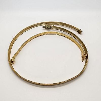 LOT 104:: Vintage 18" L Goldtone Collar Necklace and 7" L Bracelet Set and 2 more bracelets