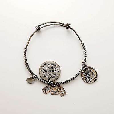 LOT 132:: I love you to the moon necklace and bracelet