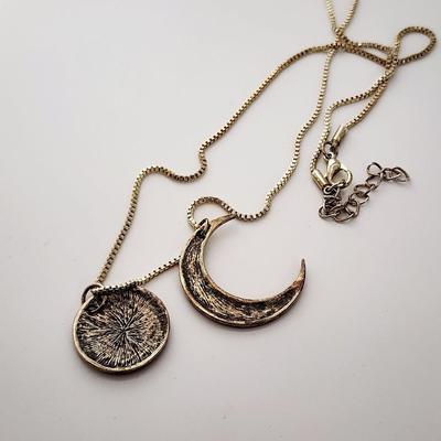 LOT 132:: I love you to the moon necklace and bracelet