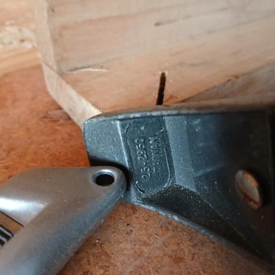 Two levels a hammer, mitre box and a Vintage Stanley Rasp