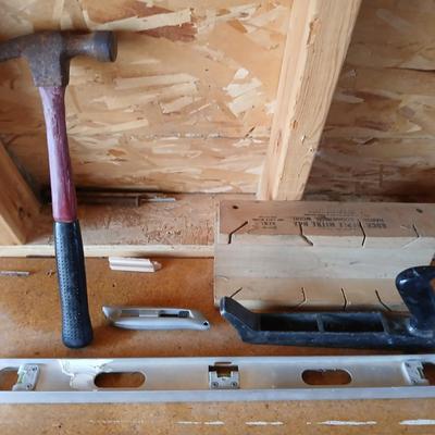 Two levels a hammer, mitre box and a Vintage Stanley Rasp