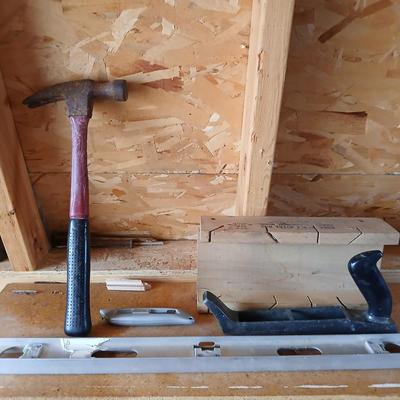 Two levels a hammer, mitre box and a Vintage Stanley Rasp