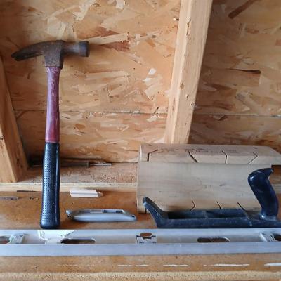 Two levels a hammer, mitre box and a Vintage Stanley Rasp