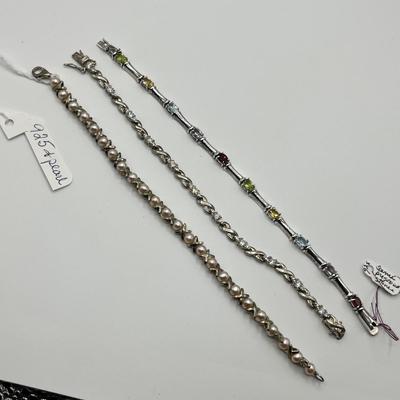 Lot 491 Sterling Silver & gemstone Bracelets