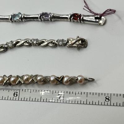 Lot 491 Sterling Silver & gemstone Bracelets