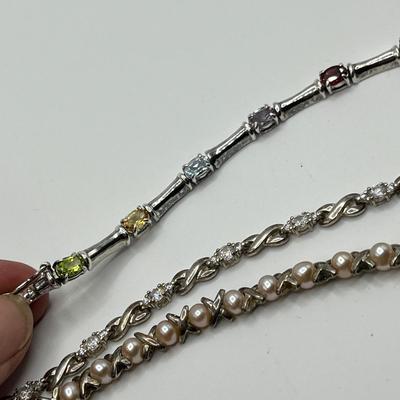 Lot 491 Sterling Silver & gemstone Bracelets