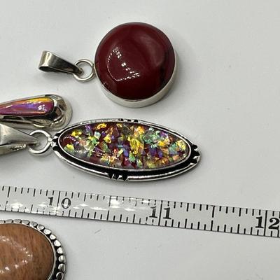 Lot 492 Sterling pendants w/ stones