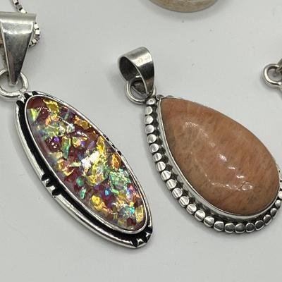 Lot 492 Sterling pendants w/ stones