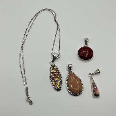 Lot 492 Sterling pendants w/ stones