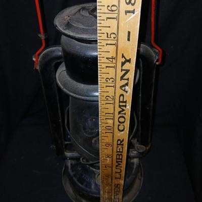 Vintage kerosene lantern marked Marshwells No. 32 Cold Blast with embossed globe