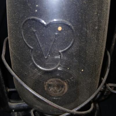 Vintage kerosene lantern marked Marshwells No. 32 Cold Blast with embossed globe
