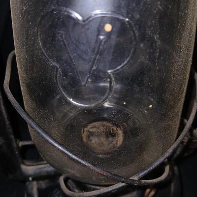Vintage kerosene lantern marked Marshwells No. 32 Cold Blast with embossed globe