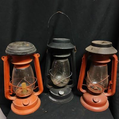 Three Vintage kerosene lantern adapted to be solar