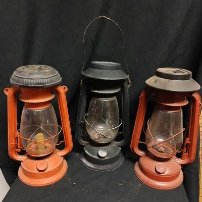 Three Vintage kerosene lantern adapted to be solar