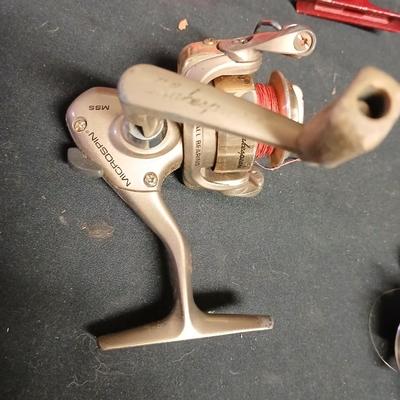 Five Open face fishing reels with fishing string
