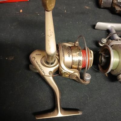 Five Open face fishing reels with fishing string