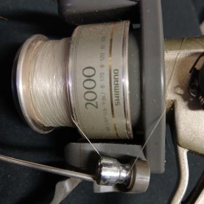 Five Open face fishing reels with fishing string