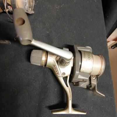 Five Open face fishing reels with fishing string