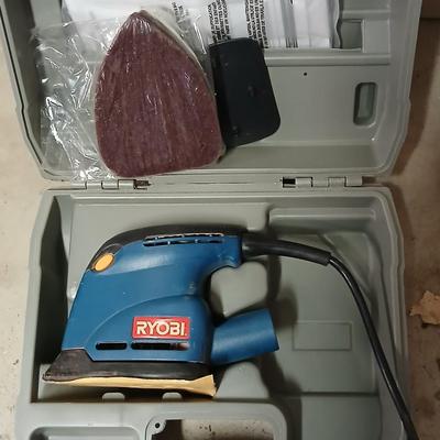 Electric Ryobi Corner cat sander with blow mold case and extra sandpaper