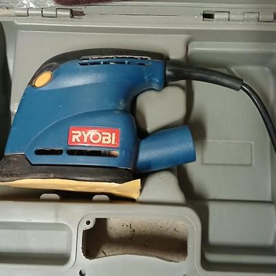 Electric Ryobi Corner cat sander with blow mold case and extra sandpaper