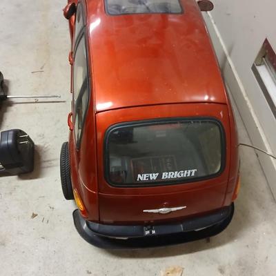 Large 9.5-volt battery-operated remote-controlled PT Cruiser with charger