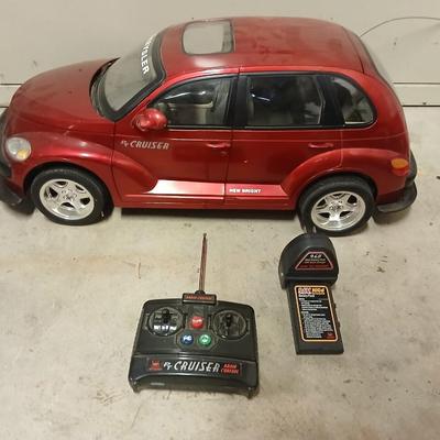 Large 9.5-volt battery-operated remote-controlled PT Cruiser with charger