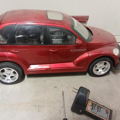 Large 9.5-volt battery-operated remote-controlled PT Cruiser with charger