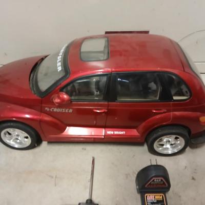 Large 9.5-volt battery-operated remote-controlled PT Cruiser with charger
