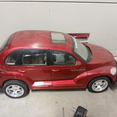 Large 9.5-volt battery-operated remote-controlled PT Cruiser with charger