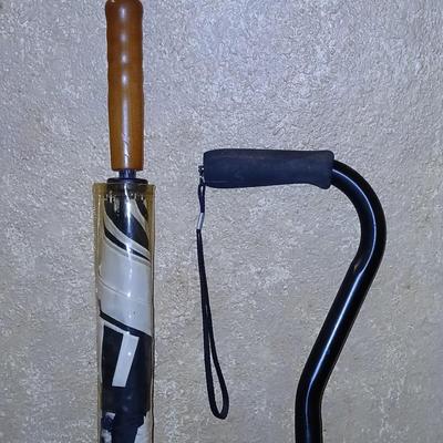 Adjustable height Walking cane in the rain! With brand new umbrella