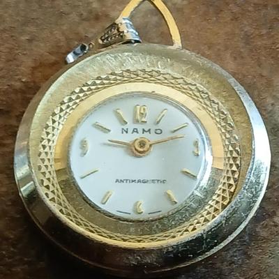 Wooden box with a clock in globe and contents of wood box - Elk pins, Jewelry 14k pendant, and more
