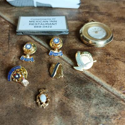 Wooden box with a clock in globe and contents of wood box - Elk pins, Jewelry 14k pendant, and more